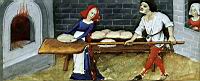 Boulanger cuisant le pain